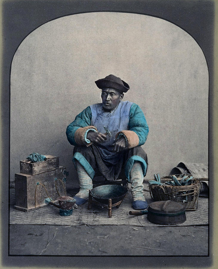Man Sitting with Tools                  Photograph by S Paul Sahm