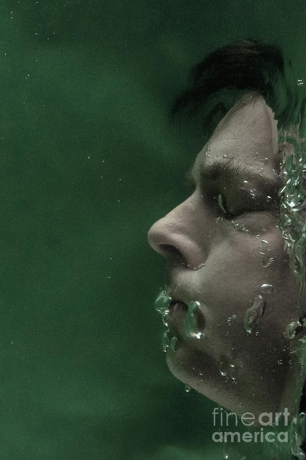 Man underwater one Photograph by Clayton Bastiani