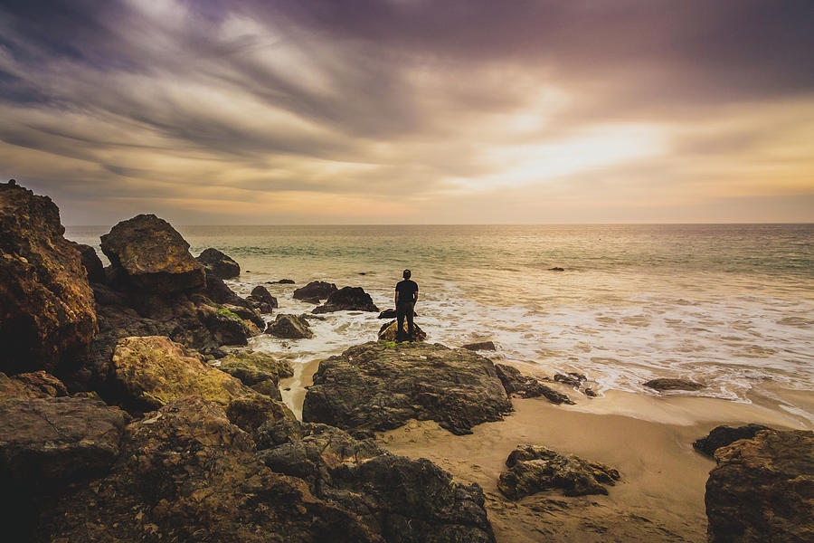 Man Watching Sunset in Malibu Photograph by Andy Konieczny