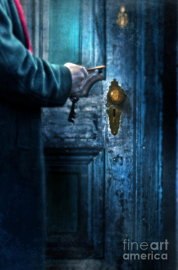 Man with Keys at Door Photograph by Jill Battaglia