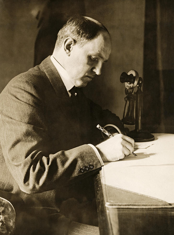 Man Writing At HIs Desk Photograph by Underwood Archives