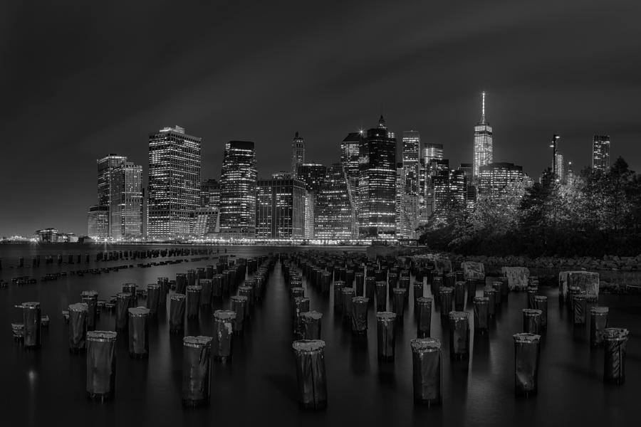 Architecture Photograph - Manhattan and the Brooklyn Pileons in Black and White by Andres Leon