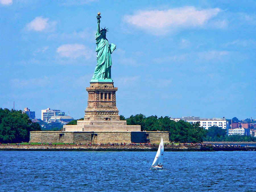 Manhattan - Sailboat By Statue of Liberty Photograph by Susan Savad