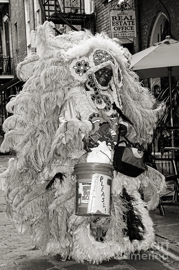 Mardi Gras Indian in Pirates Alley in black and white Photograph by Kathleen K Parker
