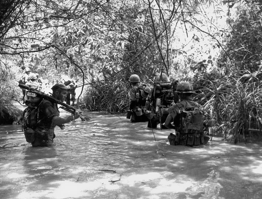 Jungle Photograph - Marines Use Stream For Trail by Underwood Archives