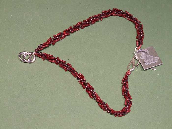 Maroon and brown lacy weave with sterling pendant Jewelry by Susan Anderson Maroon and brown lacy weave with sterling pendant Jewelry by Susan Anderson