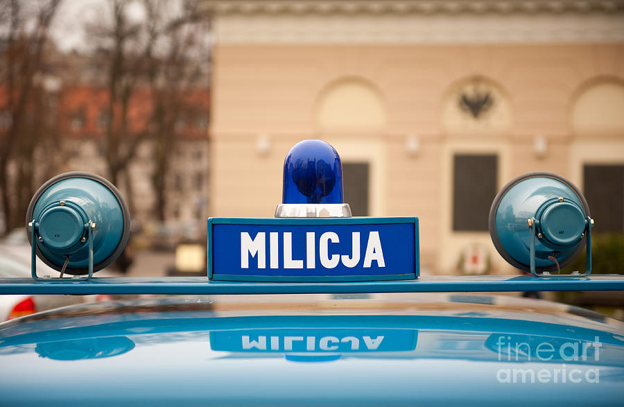 Transportation Photograph - Martial law Militia blue car cherry by Arletta Cwalina