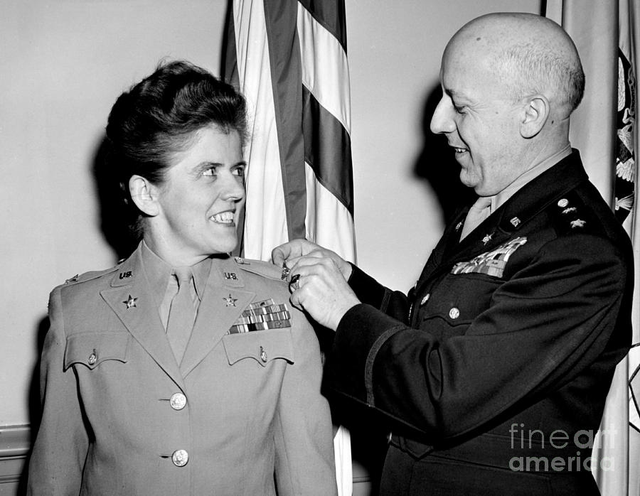 Mary A. Hallaren Director Of WACS Receives the shoulder eagles from Maj ...