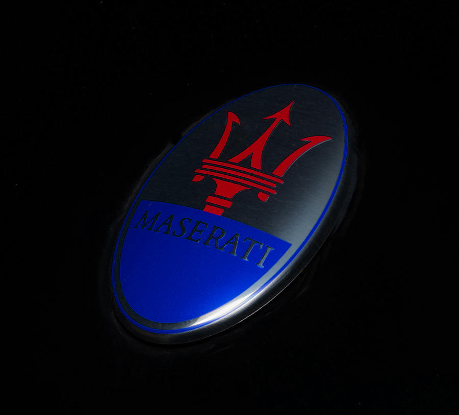 Car Photograph - Maserati Emblem by Larry Helms