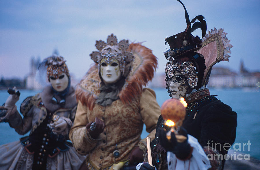 Masks and luminous globe Photograph by Riccardo Mottola