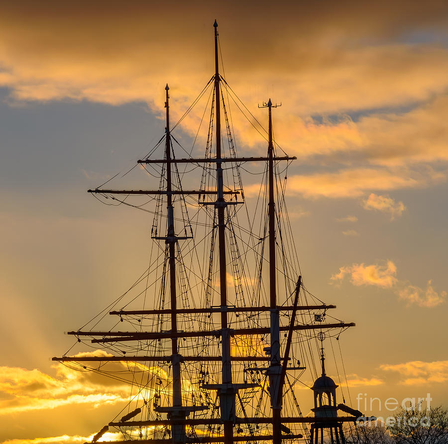 Masts against the sunset Photograph by Colin Rayner