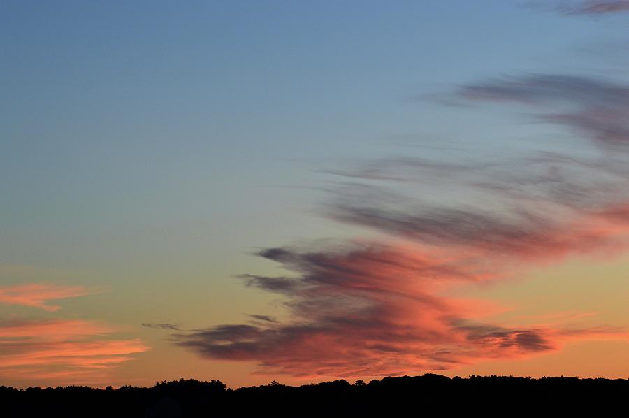 Mauve Clouds In A Blue Sky  Photograph by Lyle Crump