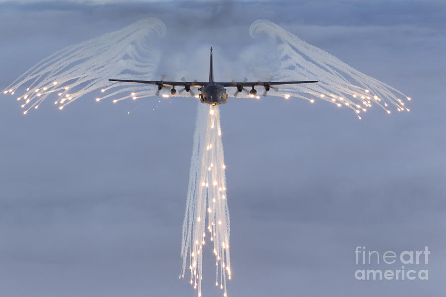 Mc-130h Combat Talon Dropping Flares Photograph by Gert Kromhout