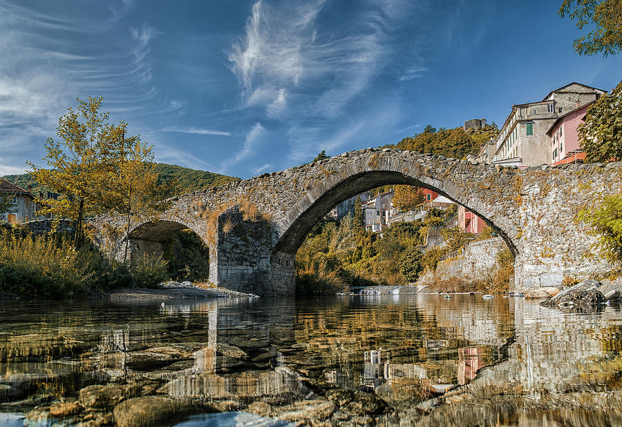 Medieval bridge Photograph by Livio Ferrari