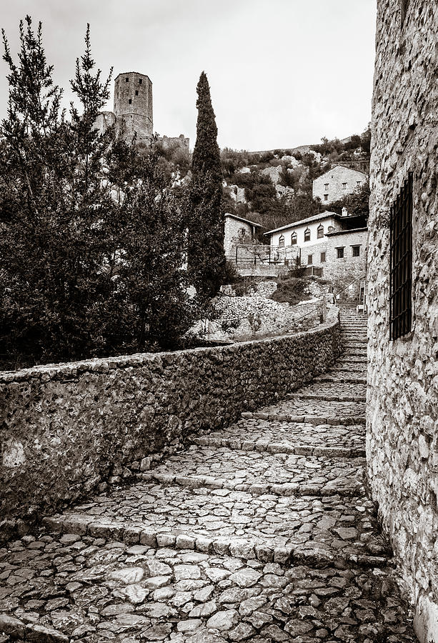 Medieval street in Pocitelj Photograph by Alexey Stiop