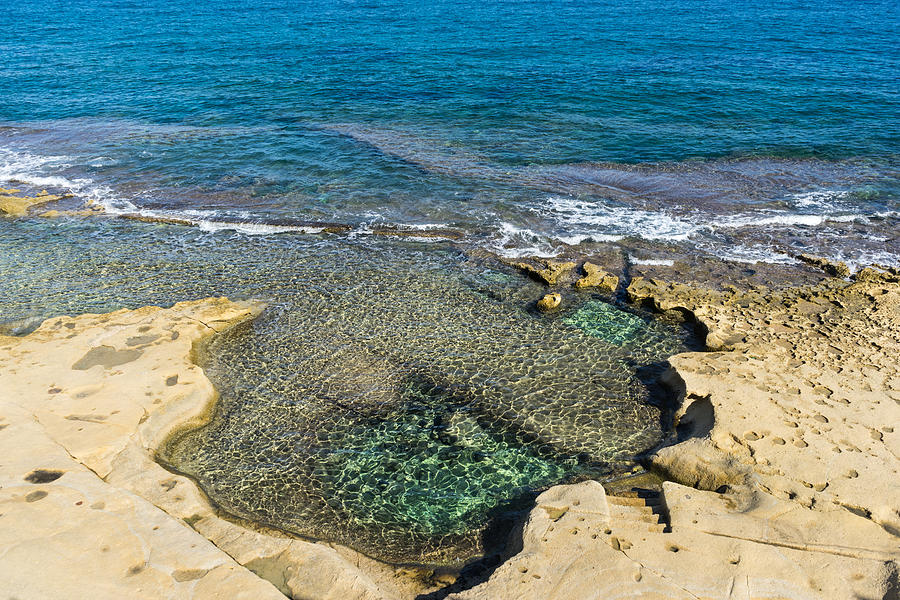 Mediterranean Delight - Maltese Natural Beach Pool with a Sleeping Giant Photograph by Georgia Mizuleva