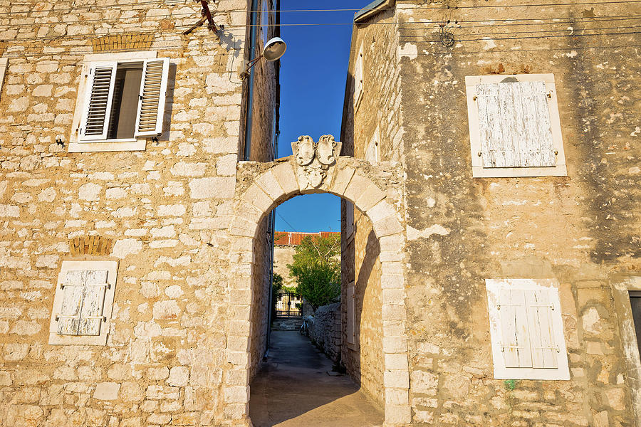 Mediterranean village of Zlarin stone architecture and gate view Photograph by Brch Photography