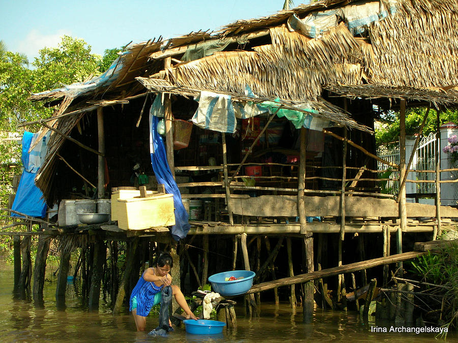 Mekong River Chores Photograph by Irina ArchAngelSkaya