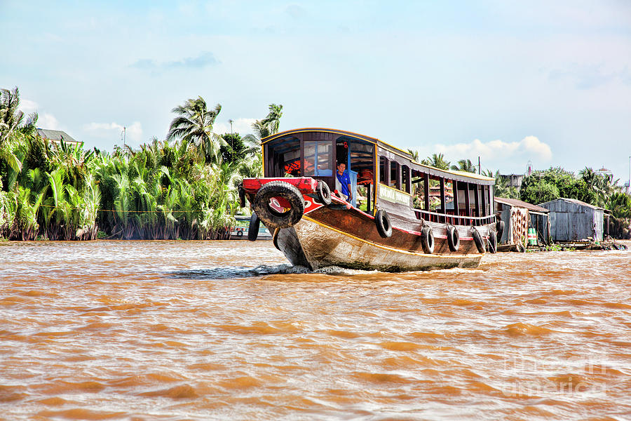 Mekong Tourist Boat Transportation on the Delta  Photograph by Chuck Kuhn
