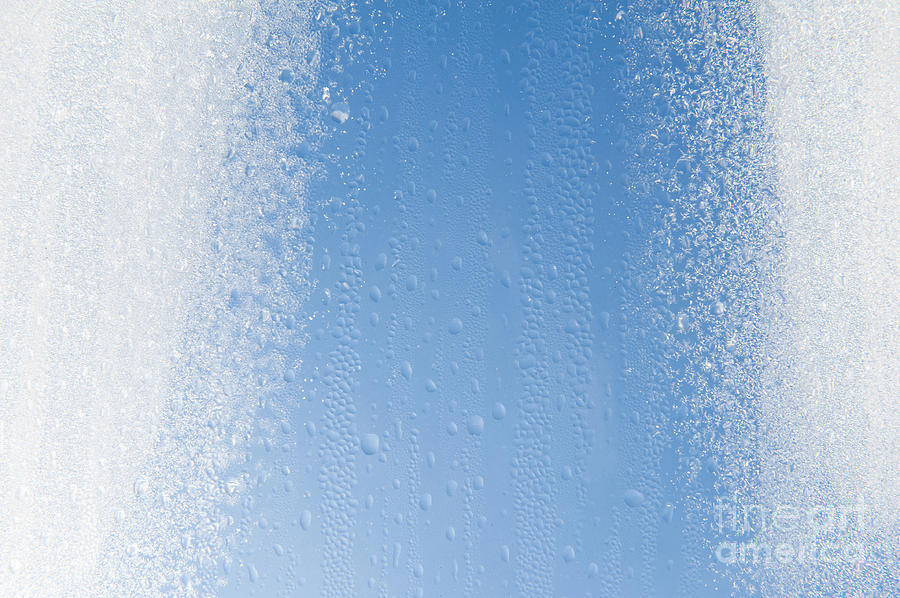 Melting Snow On Glass Photograph