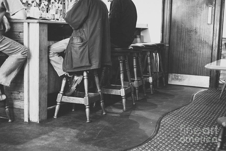 Black And White Photograph - Men at a bar by Patricia Hofmeester