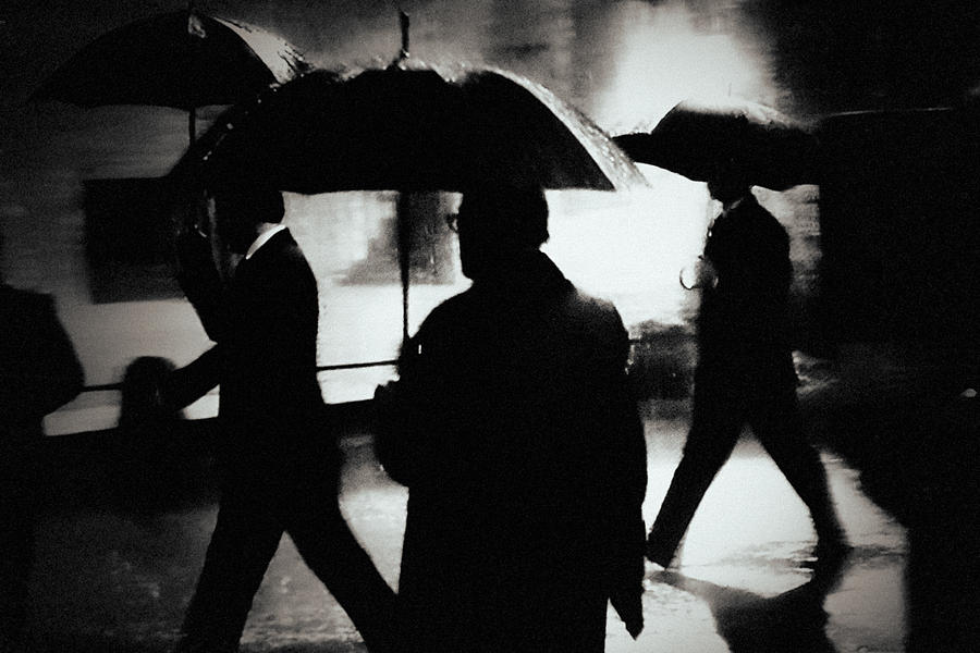 Black And White Photograph - Men In The Rain by Holger Droste