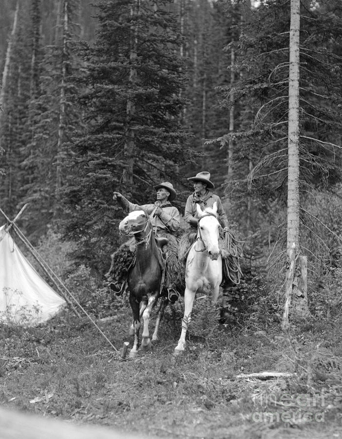 Men Riding Horses Through Camp, C.1920s Photograph by H. Armstrong Roberts/ClassicStock