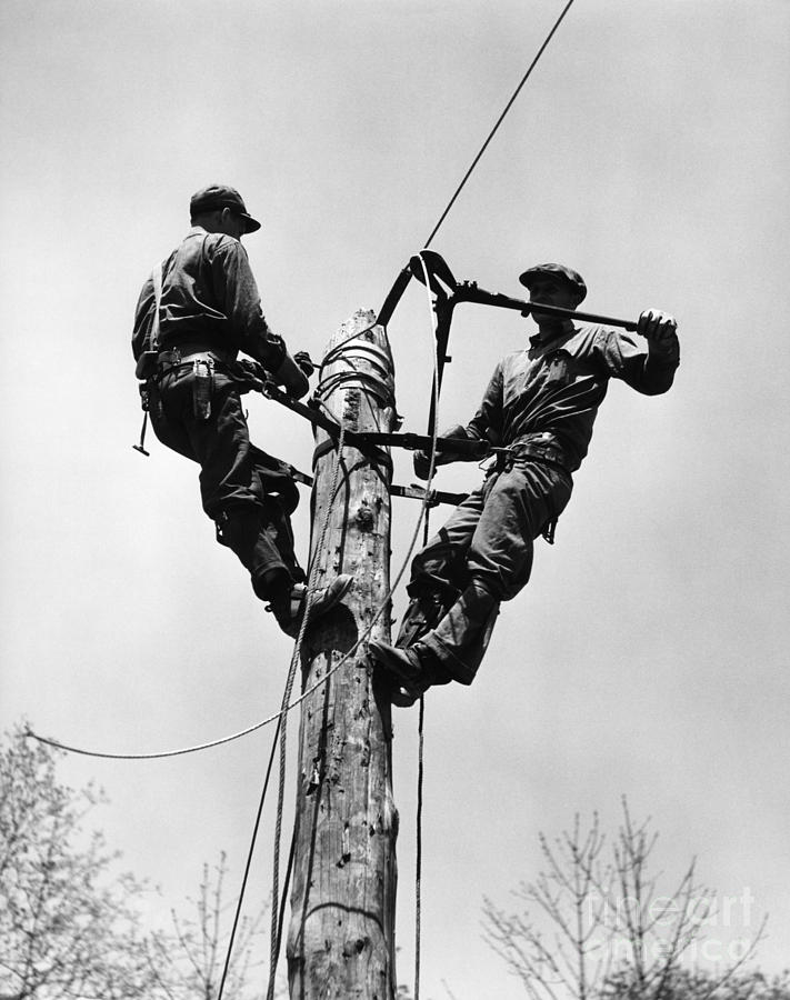 Men Working On Power Line, C.1930-40s Photograph by H. Armstrong Roberts/ClassicStock