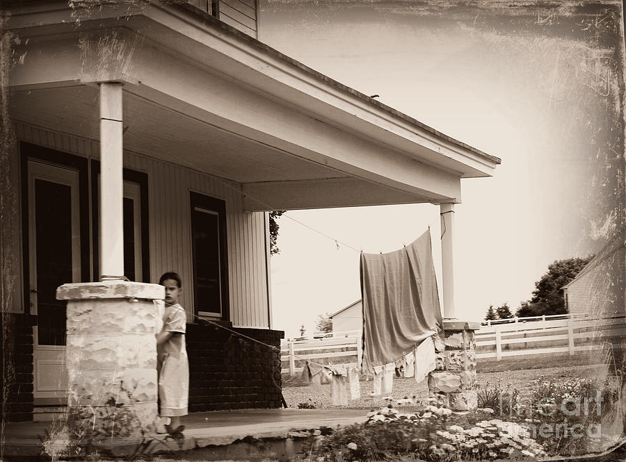 Mennonite Girl Hanging Laundry Photograph by Beth Ferris Sale