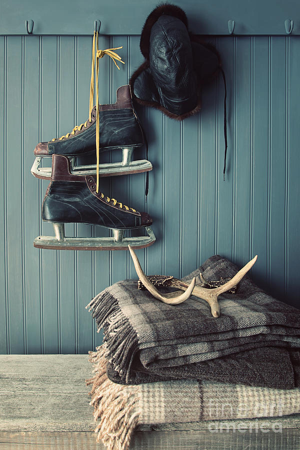 Mens vintage skates  hanging on hooks Photograph by Sandra Cunningham