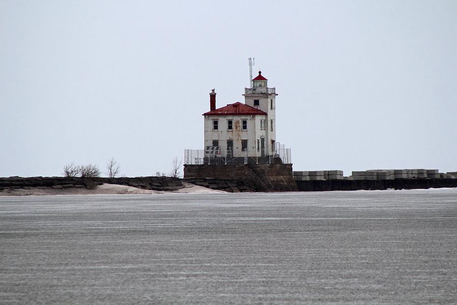 Mentor Headlands Lighthouse in Winter Photograph by Michiale Schneider