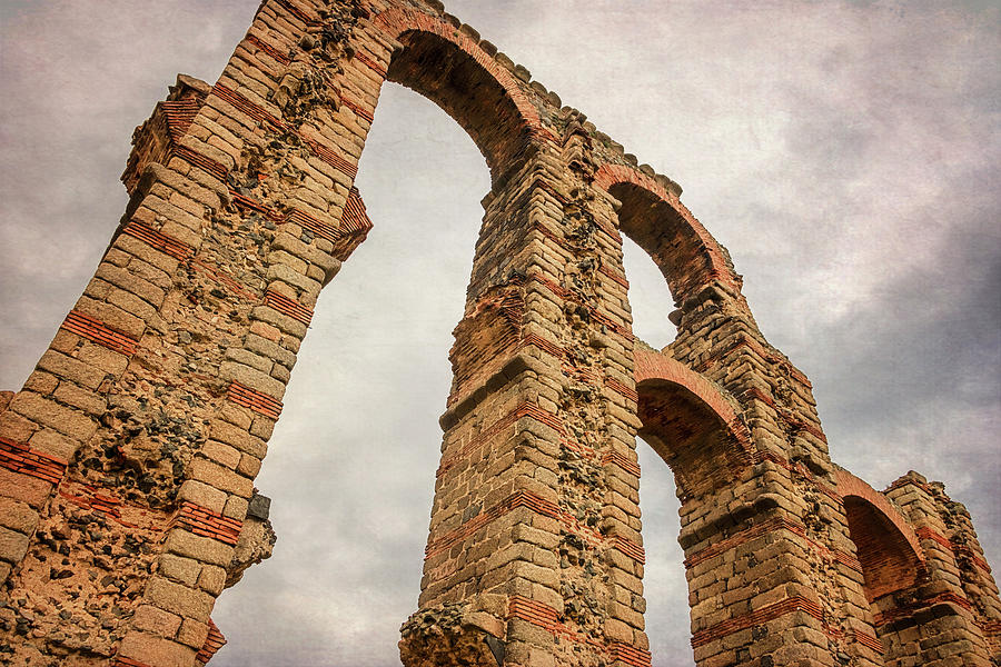 Architecture Photograph - Merida Spain Aqueduct Dusk by Joan Carroll