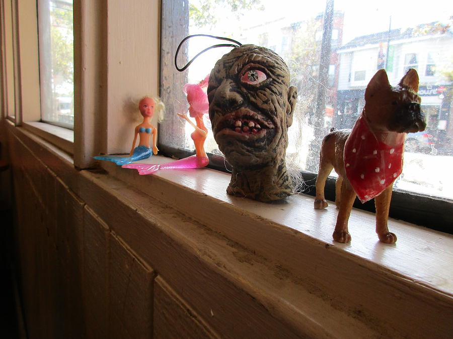 Cafe Windowsill 4 Mermaids Monster Head And Dog Photograph By