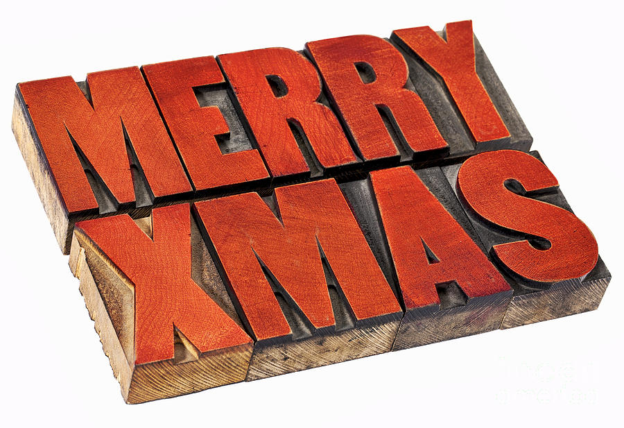 Merry Christmas in wood type Photograph by Marek Uliasz