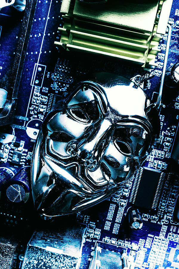 Metal anonymous mask on motherboard Photograph by Jorgo Photography