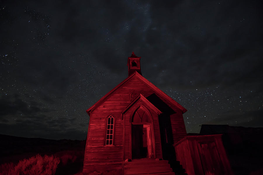 Methodist church in red lights, Bodie, California Photograph by Karen Foley