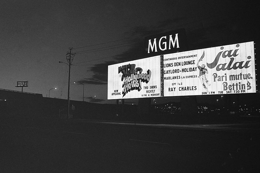 MGM neon signs at dusk Ray Charles Las Vegas Nevada 1979 Photograph by David Lee Guss