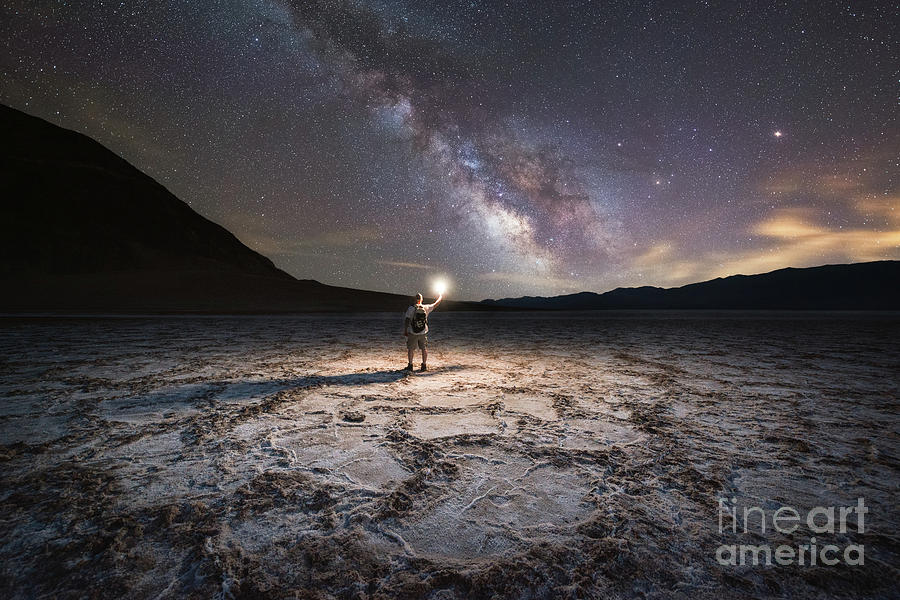 Midnight Explorer at Badwater Basin  Photograph by Michael Ver Sprill