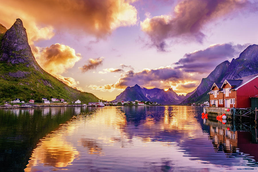 Midnight sun reflections in Reine Photograph by Dmytro Korol