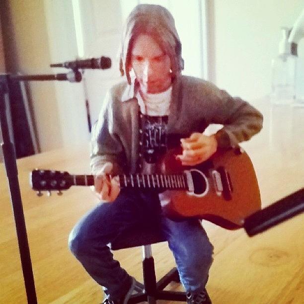 Music Photograph - Mini Figure Of Kurt Cobain Playing by Mae Coy