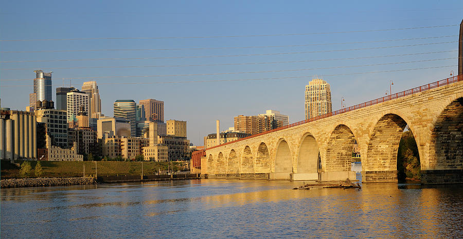 Minneapolis highrise tower skyline and the Stone Arch Bridge on ...