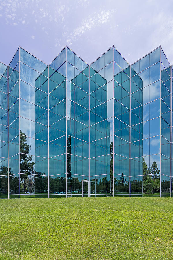 Mirror Imaged Office Building Photograph by Robert VanDerWal