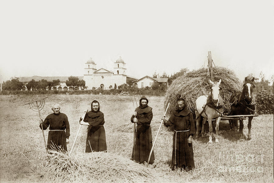 Fathers Photograph - Mission Fathers raking hay in a field in front of Santa Barbara 1898 by Monterey County Historical Society