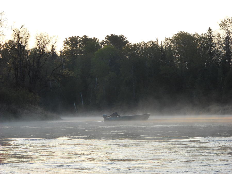 Mississippi river fisherman at dawn Photograph by Kent Lorentzen