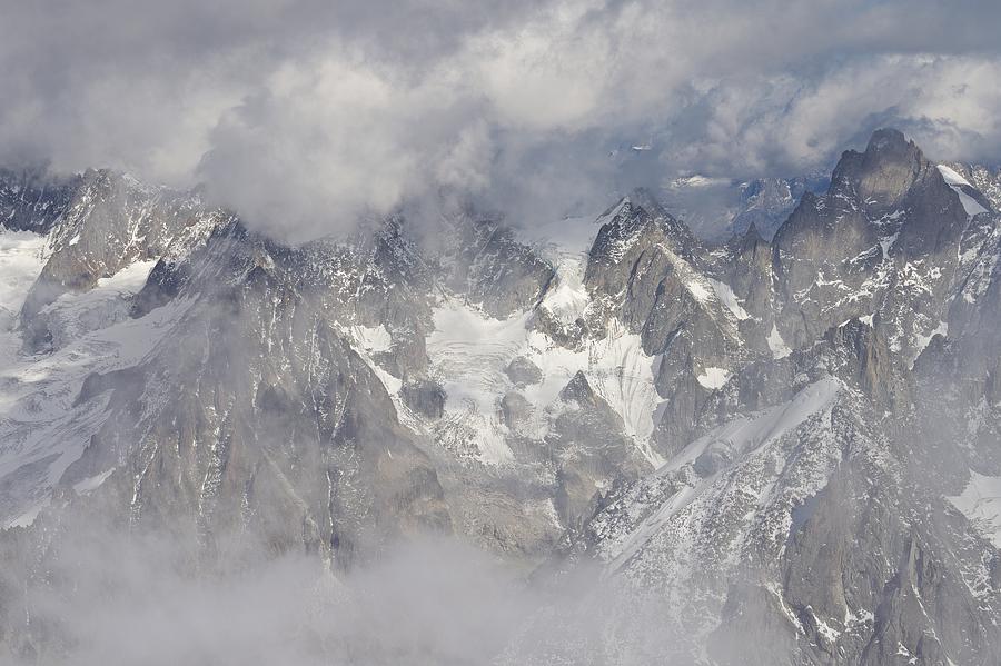 Mist and Clouds at Auiguille Du Midi Photograph by Stephen Taylor