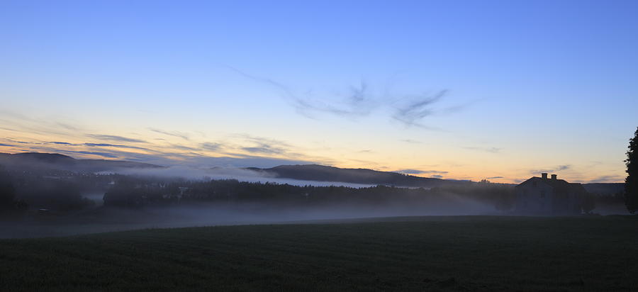 Mists rising from a meadow at dusk Photograph by Ulrich Kunst And Bettina Scheidulin
