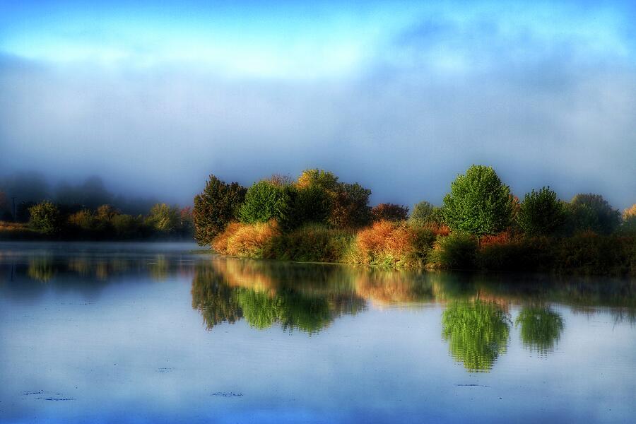 Misty fall colors on the river Photograph by Lynn Hopwood