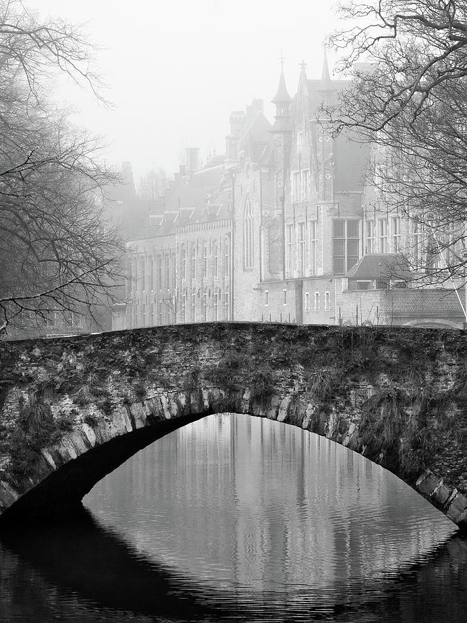 Architecture Photograph - Misty Morning Canal in Bruges by Barry O Carroll