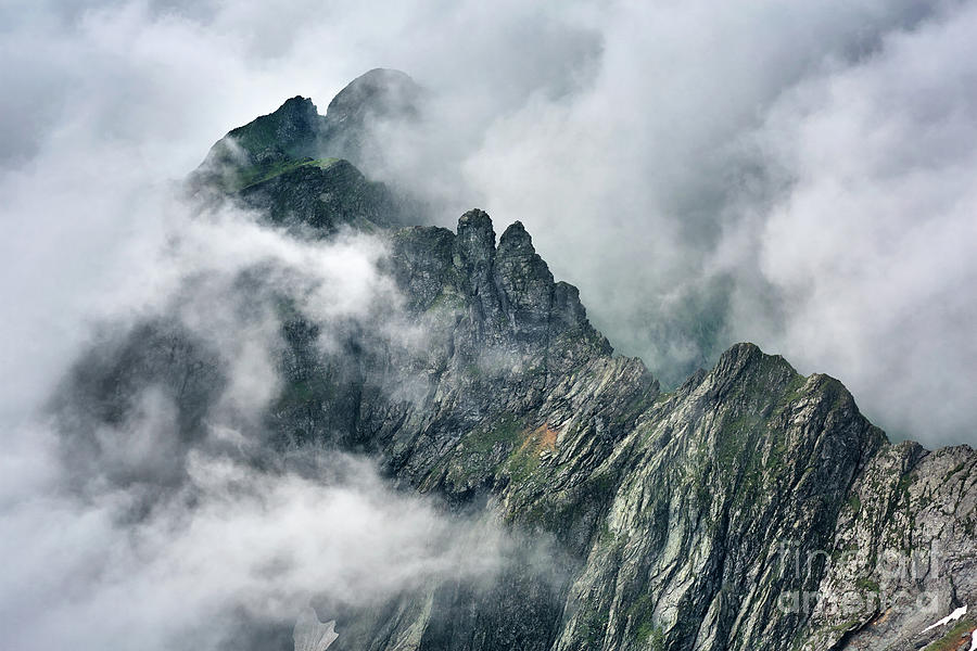 Misty rocky mountains Photograph by Ragnar Lothbrok