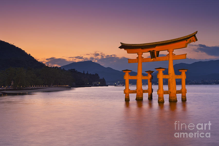 Sunset Photograph - Miyajima torii gate near Hiroshima in Japan at sunset by Sara Winter